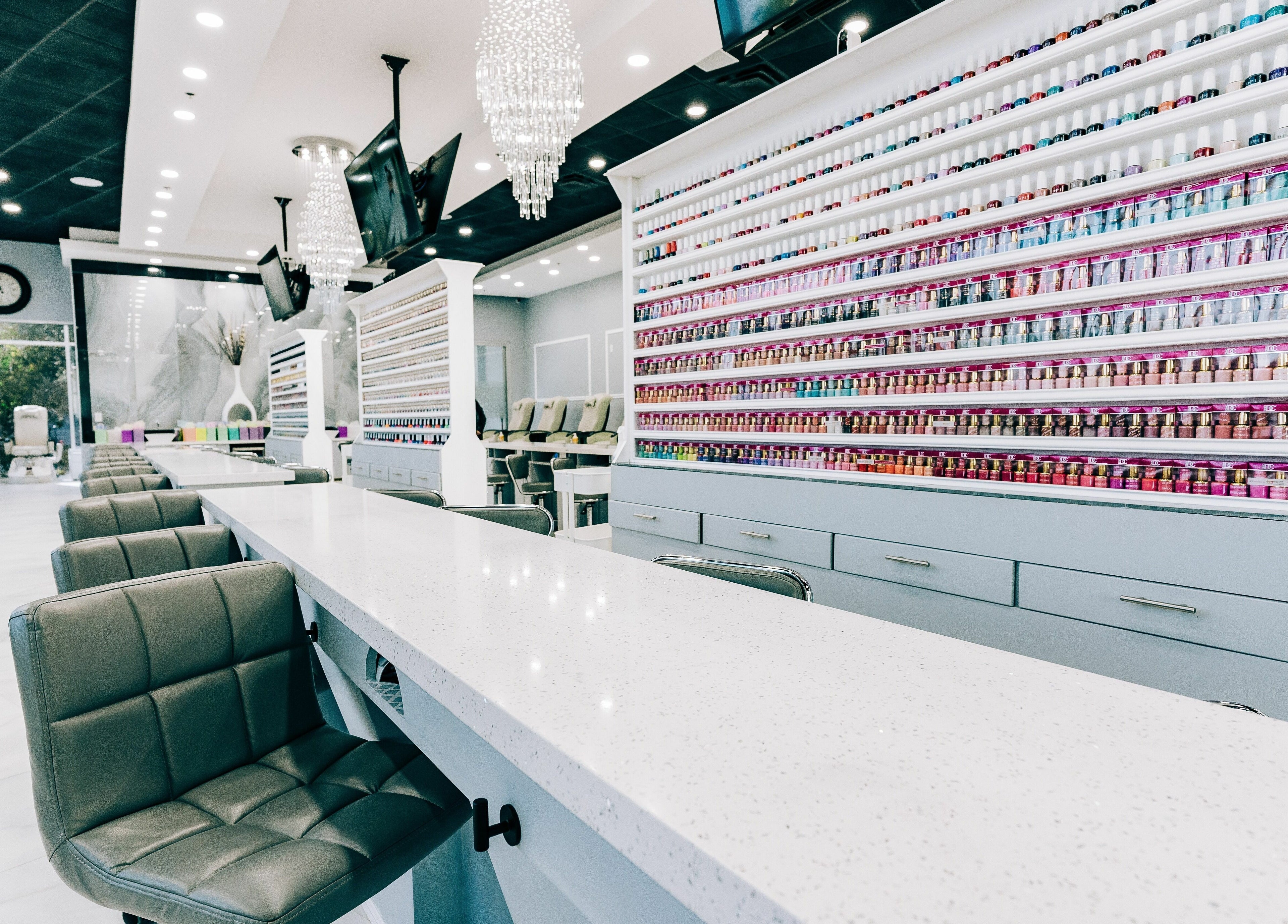 Chic interior of Greenfield Nails and Spa - Chandler with elegant seating and nail polish display in Chandler, Arizona, US.