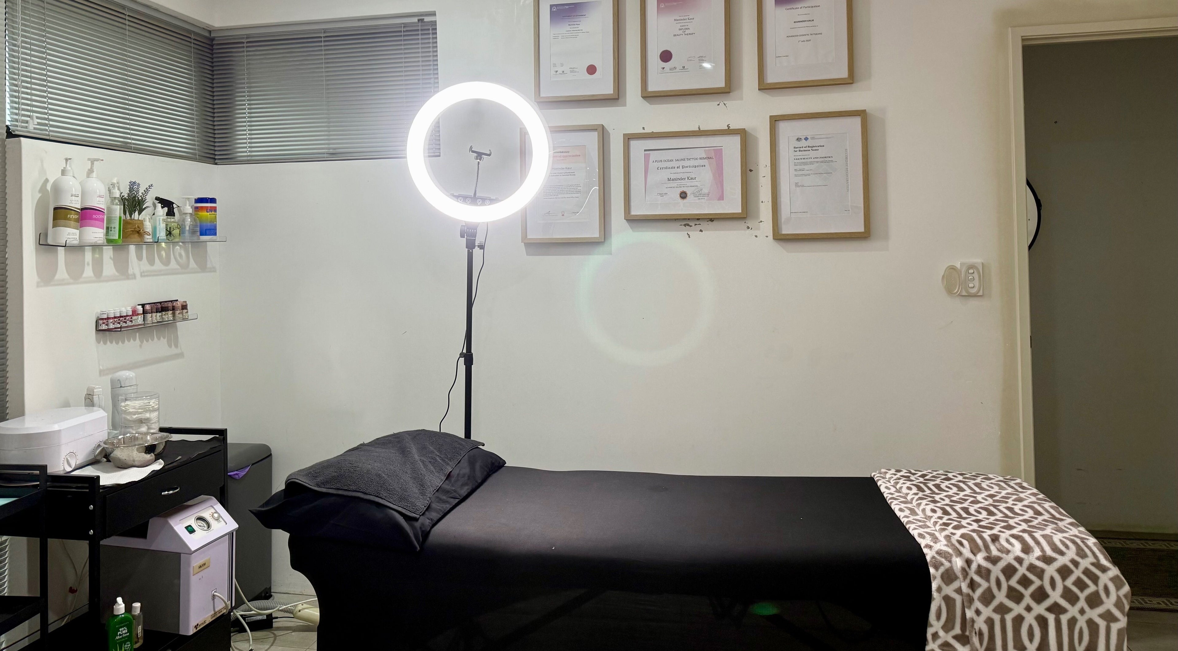 Nrich Glow treatment room in Brabham, Western Australia, AU, featuring a massage table and soothing decor.