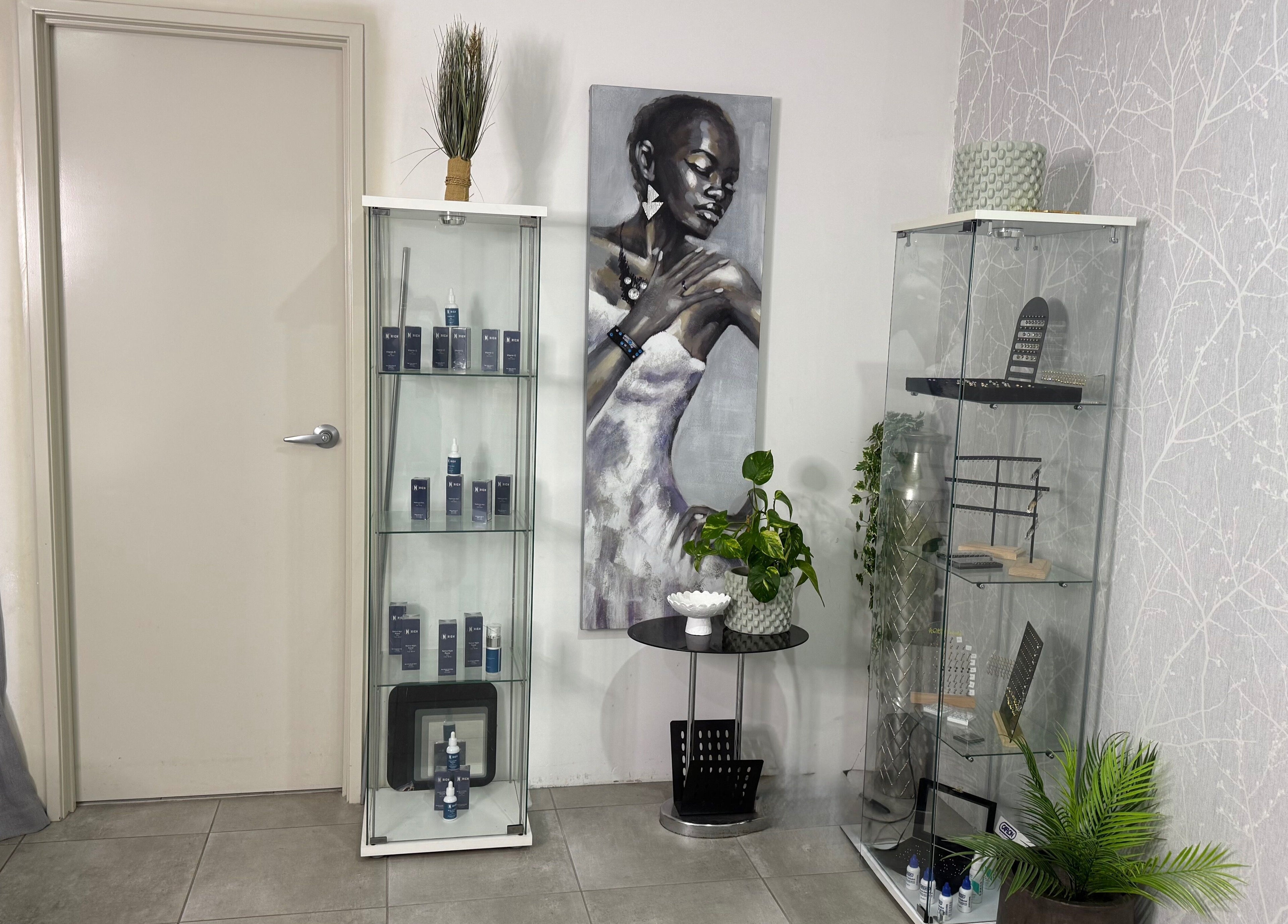 Showcase at Nrich Glow, Brabham, WA featuring beauty products beside art and plants.