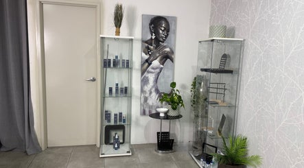 Showcase at Nrich Glow, Brabham, WA featuring beauty products beside art and plants.