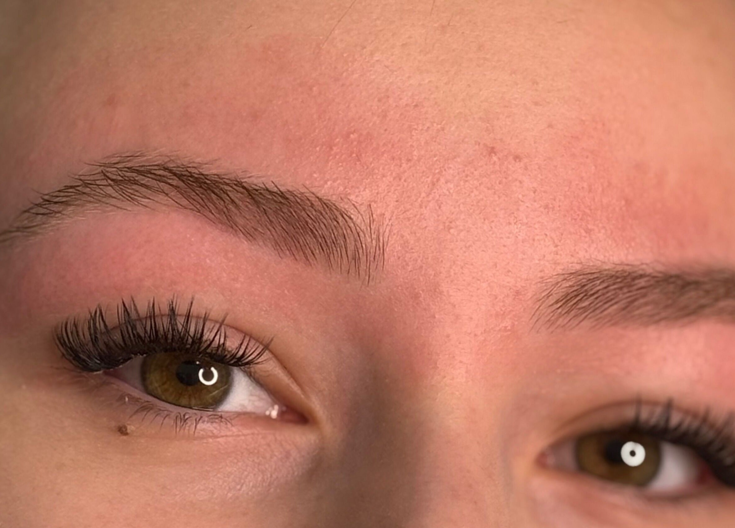 Close-up of perfectly shaped eyebrows at Nrich Glow in Brabham, Western Australia, AU showcasing beauty precision.