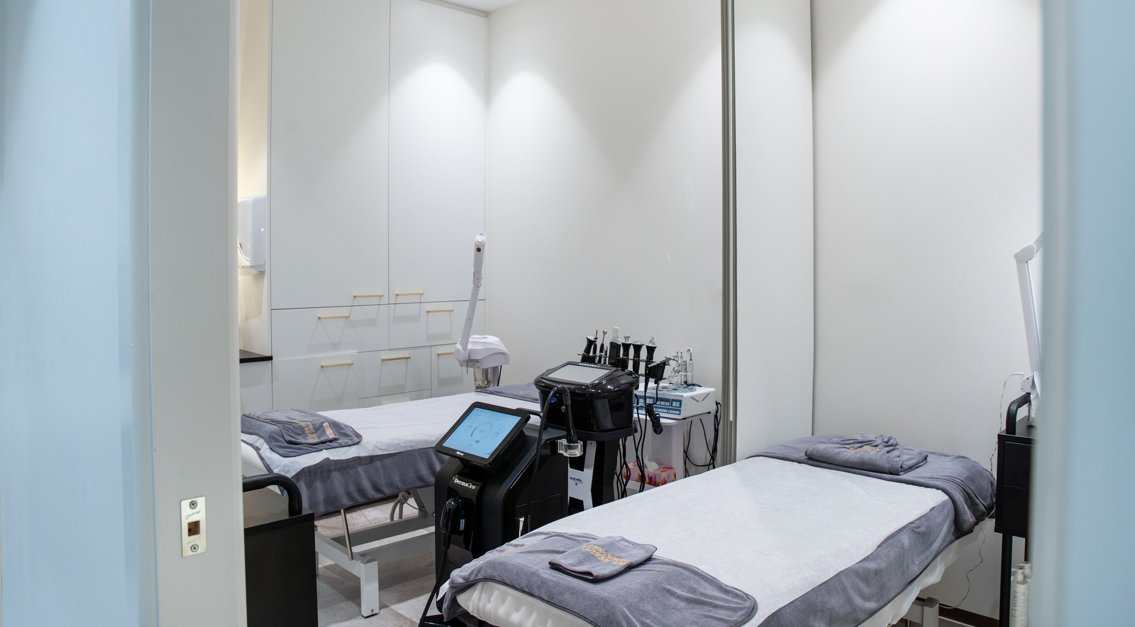 Modern dual treatment room at Sky Beauty Cosmetic Clinic - Macquarie Park, featuring advanced equipment in New South Wales, AU.