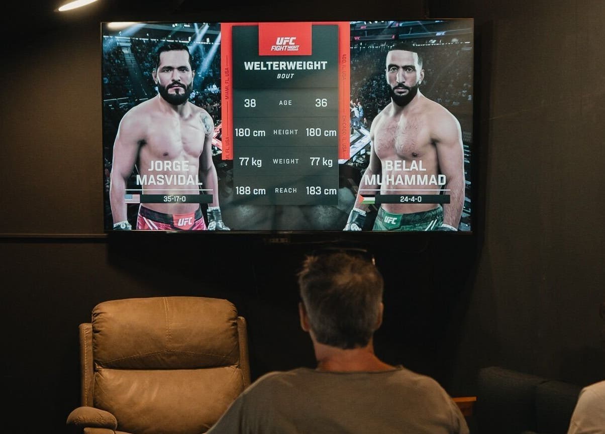 UFC fight displayed in luxury seating at Stevie's, Bali, Bali, ID. Cozy venue for sports enthusiasts.