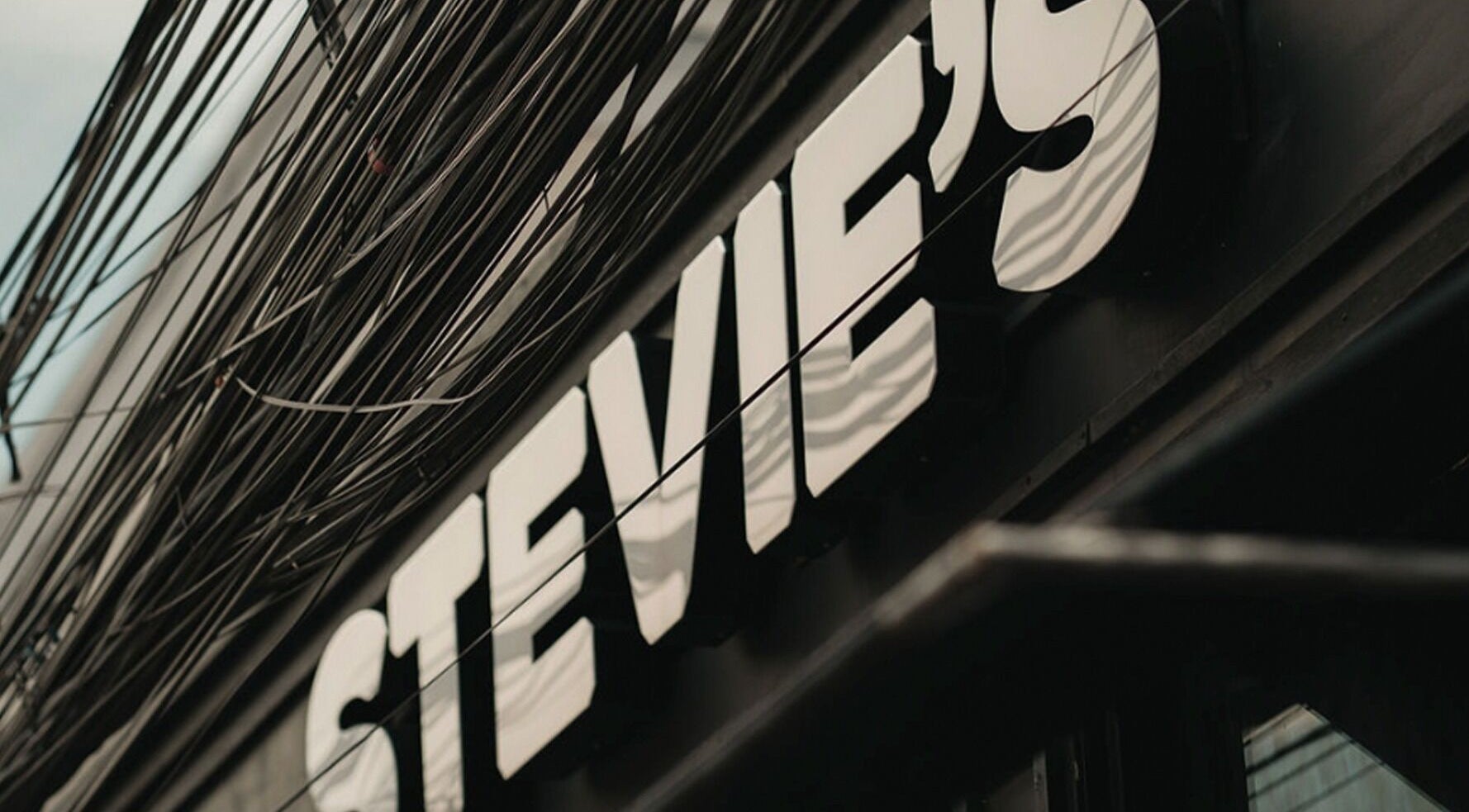 Close-up of Stevie's exterior sign at Bali, Bali, ID, showcasing sleek design.