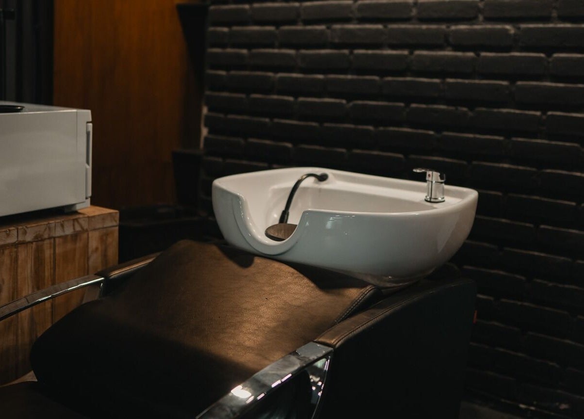 Luxurious hair washing station at Stevie's salon in Bali, Bali, ID, featuring modern design and comfort.