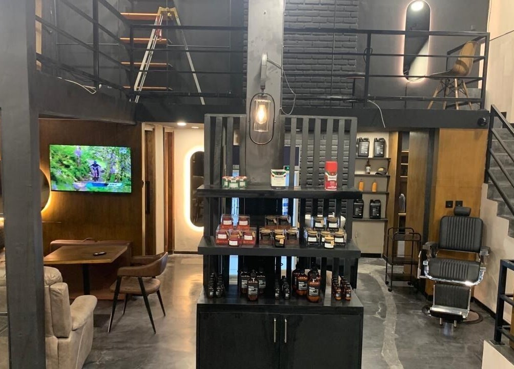 Chic, modern interior of Stevie's barbershop in Bali, Bali, ID with sleek design and relaxing lounge area.