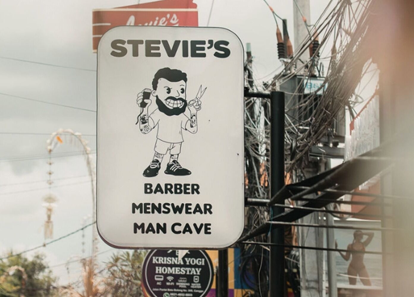 Stevie's barber shop sign in Bali, Bali, ID, showcasing menswear and man cave services.