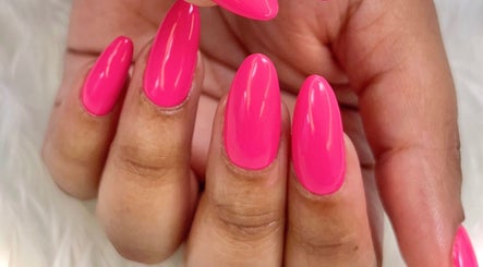 Bright pink manicured nails at Princie Beauty, Johannesburg, Gauteng, ZA. Perfect nail care and style.