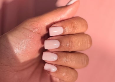 Elegant blush manicure at Princie Beauty, Johannesburg, Gauteng, ZA showcasing sleek nail design.