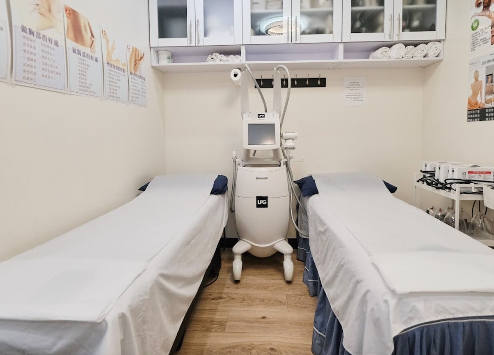 Tranquil treatment room at Healthkey Group Medspa - Flushing, New York, New York, US with dual massage tables.
