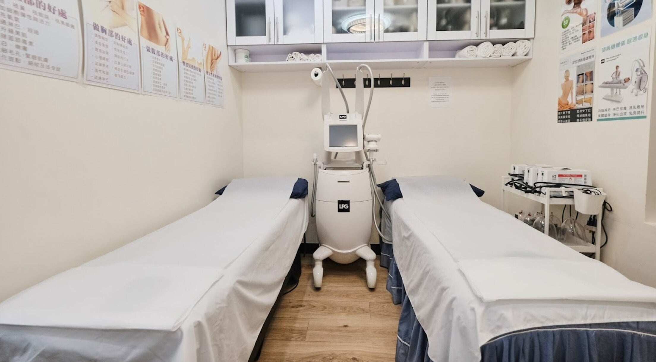 Tranquil treatment room at Healthkey Group Medspa - Flushing, New York, New York, US with dual massage tables.