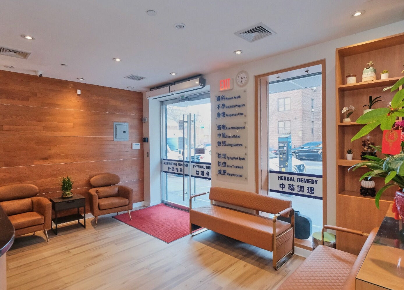 Inviting lobby of Healthkey Group Wellington - Elmhurst in New York, New York, US, featuring plants and seating.