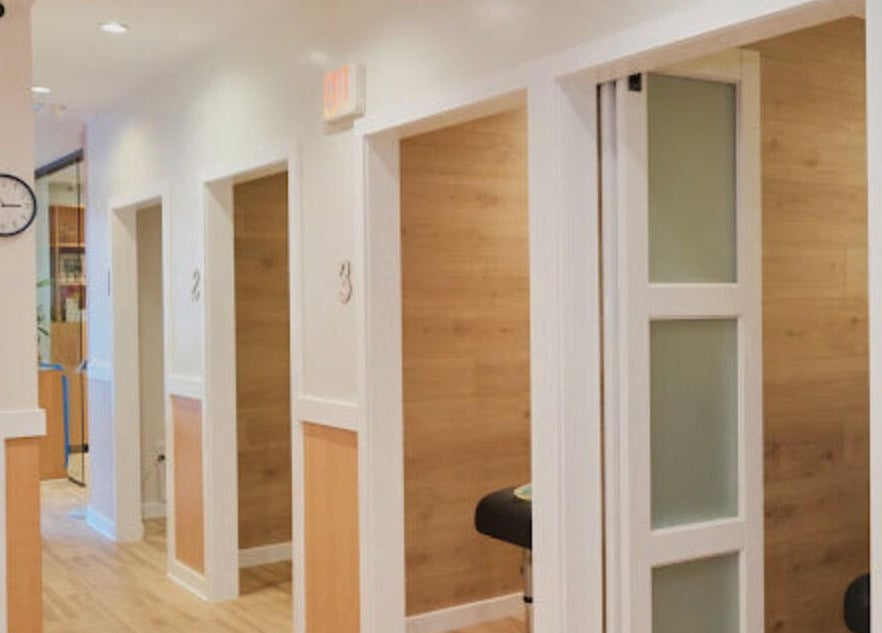 Healthkey Group Wellington - Elmhurst treatment rooms in New York, New York, US with numbered doors.