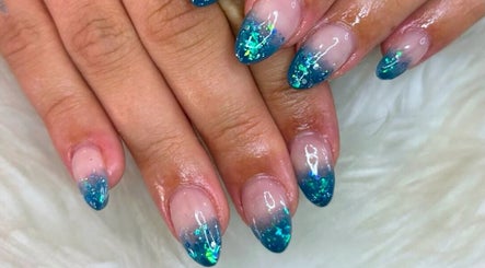Elegant blue nail art design at TranQuility, Middelburg, Mpumalanga, ZA, showcasing modern manicure style.