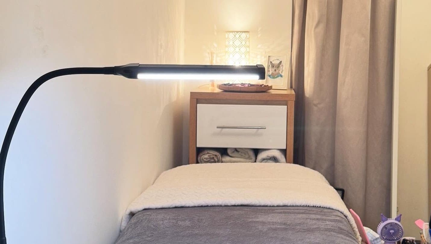 Relaxing treatment room with soft lighting at Curl Lashes, Bristol, England, GB.