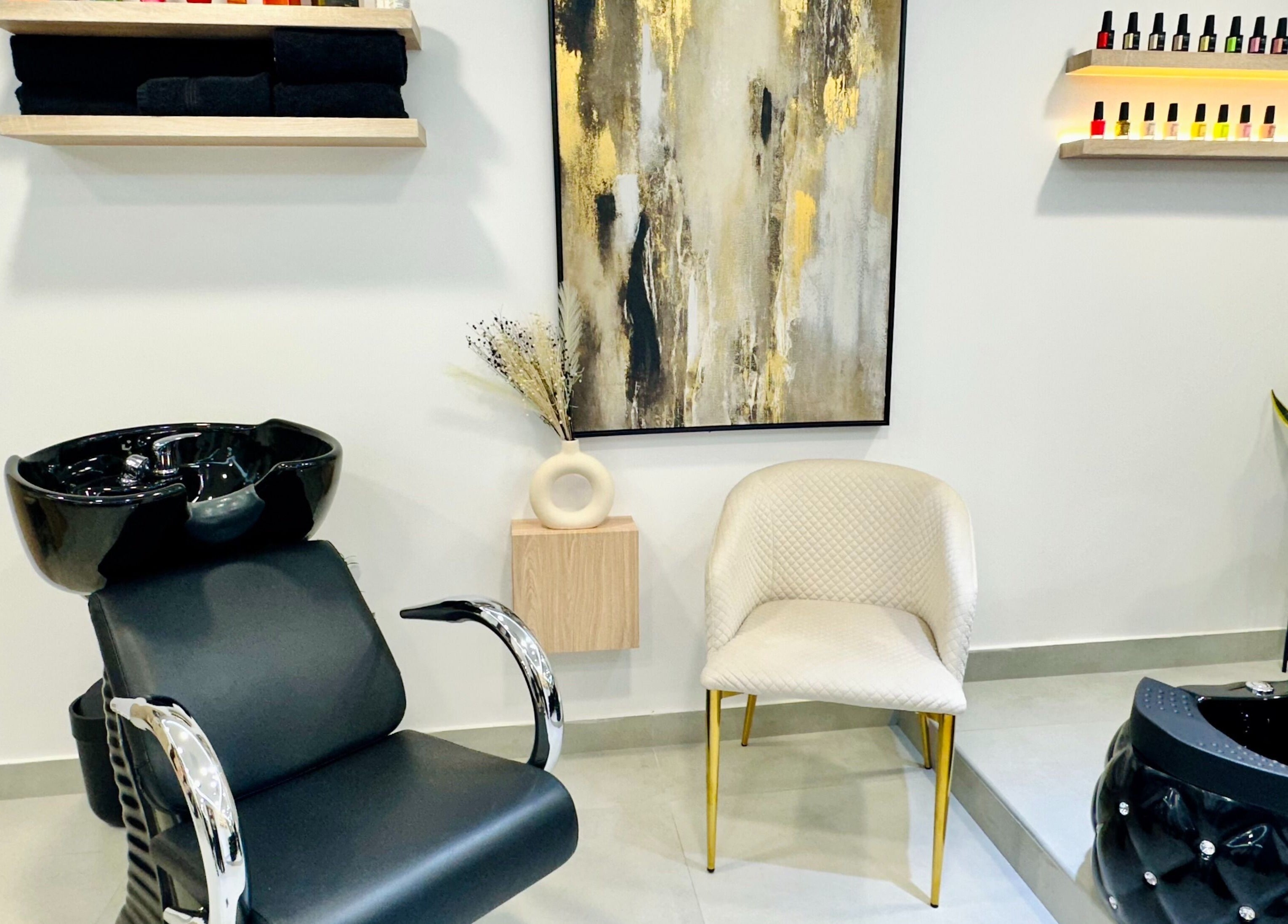Chic interior of S & J Beauty Salon in دبي, دبي, AE featuring modern chairs and stylish decor.