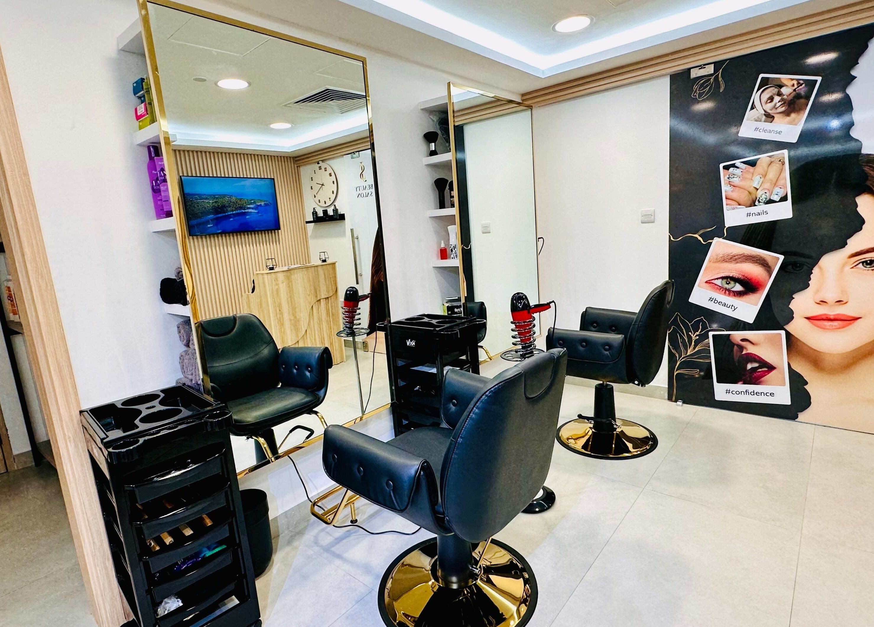 Chic interior of S & J Beauty Salon, Dubai, Dubai, AE with stylish chairs and mirrors.