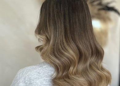 Beautiful wavy hairstyle showcased at The Coven Hair Lounge, Aylesbury, England, GB.