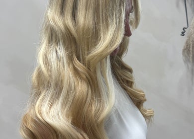 Blonde waves at The Coven Hair Lounge, Aylesbury, England, GB, showcasing luxurious hairstyling.