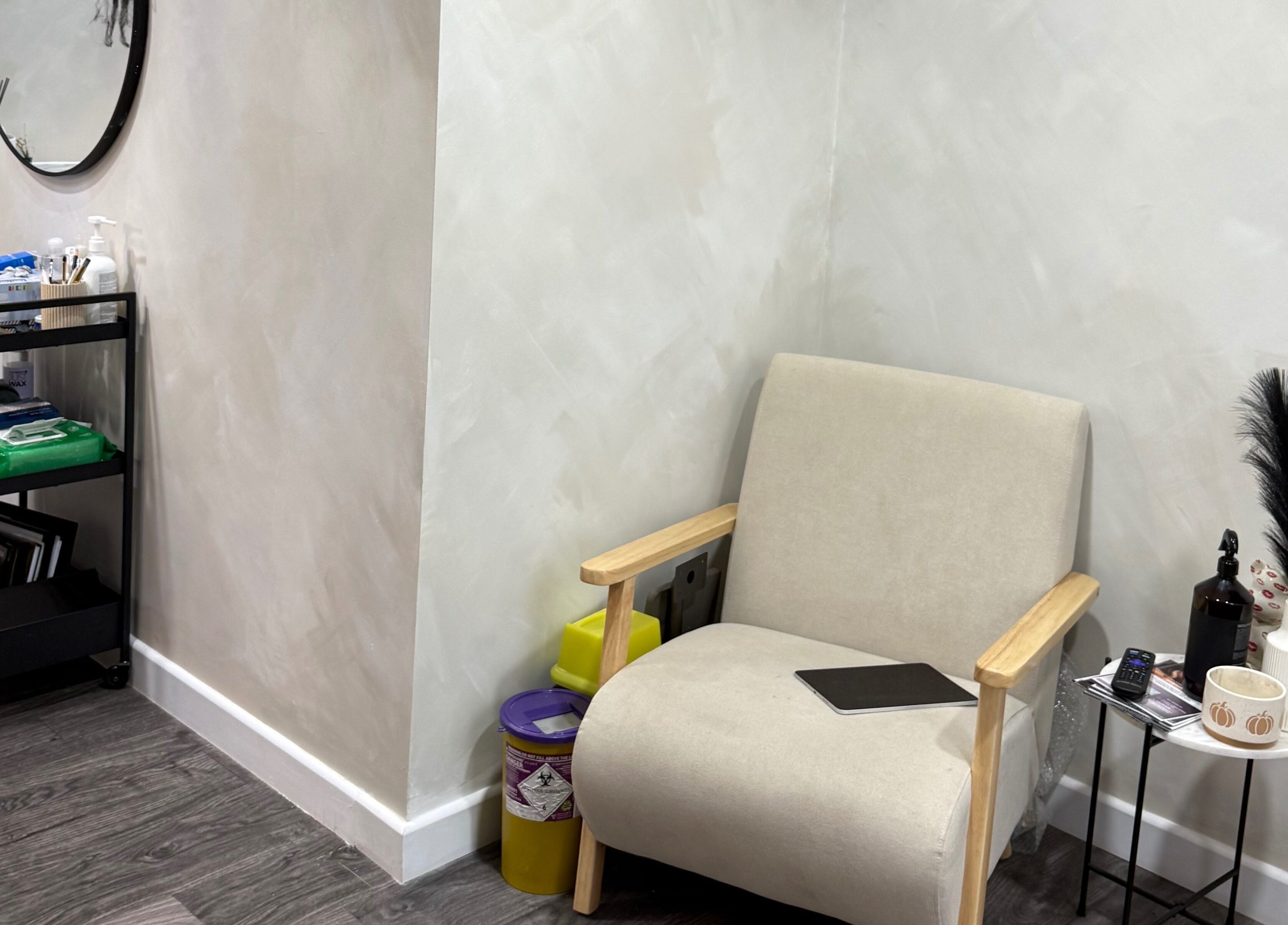 Cozy seating area at The Beauty Witch - Aesthetics, Eyebrows & Skin in Aylesbury, England, GB.