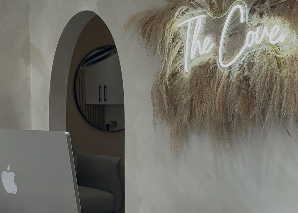 Entrance of The Coven Beauty Lounge in Aylesbury, England with modern decor and stylish ambiance.