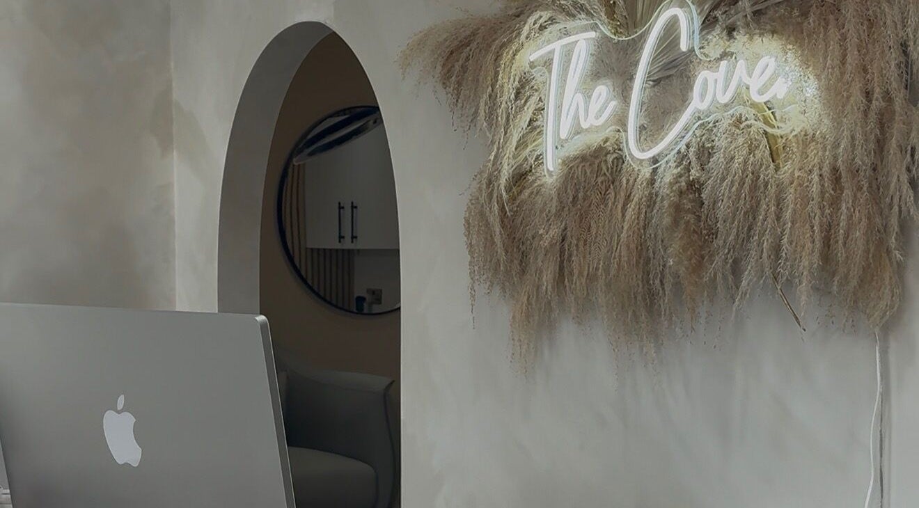 Entrance of The Coven Beauty Lounge in Aylesbury, England with modern decor and stylish ambiance.