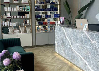 Reception area of The Skin Element - Aesthetic Clinic in Southport, Queensland, AU with products displayed.