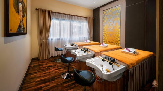 Relaxing treatment area at Sarila Wellness Spa @Watchan, Vientiane Capital, LA with massage beds and decor.