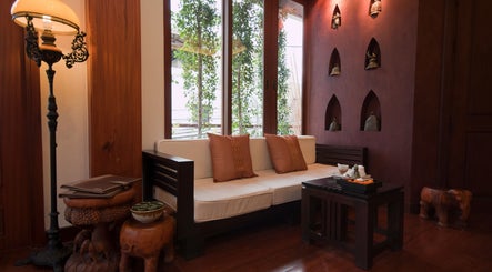 Cozy seating area with warm decor at Sarila Spa At Salana Boutique Hotel, Vientiane, Vientiane Prefecture, LA.
