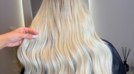 Blonde hair extensions styled at Hair Extensions By Maria, Mexborough, England, GB.