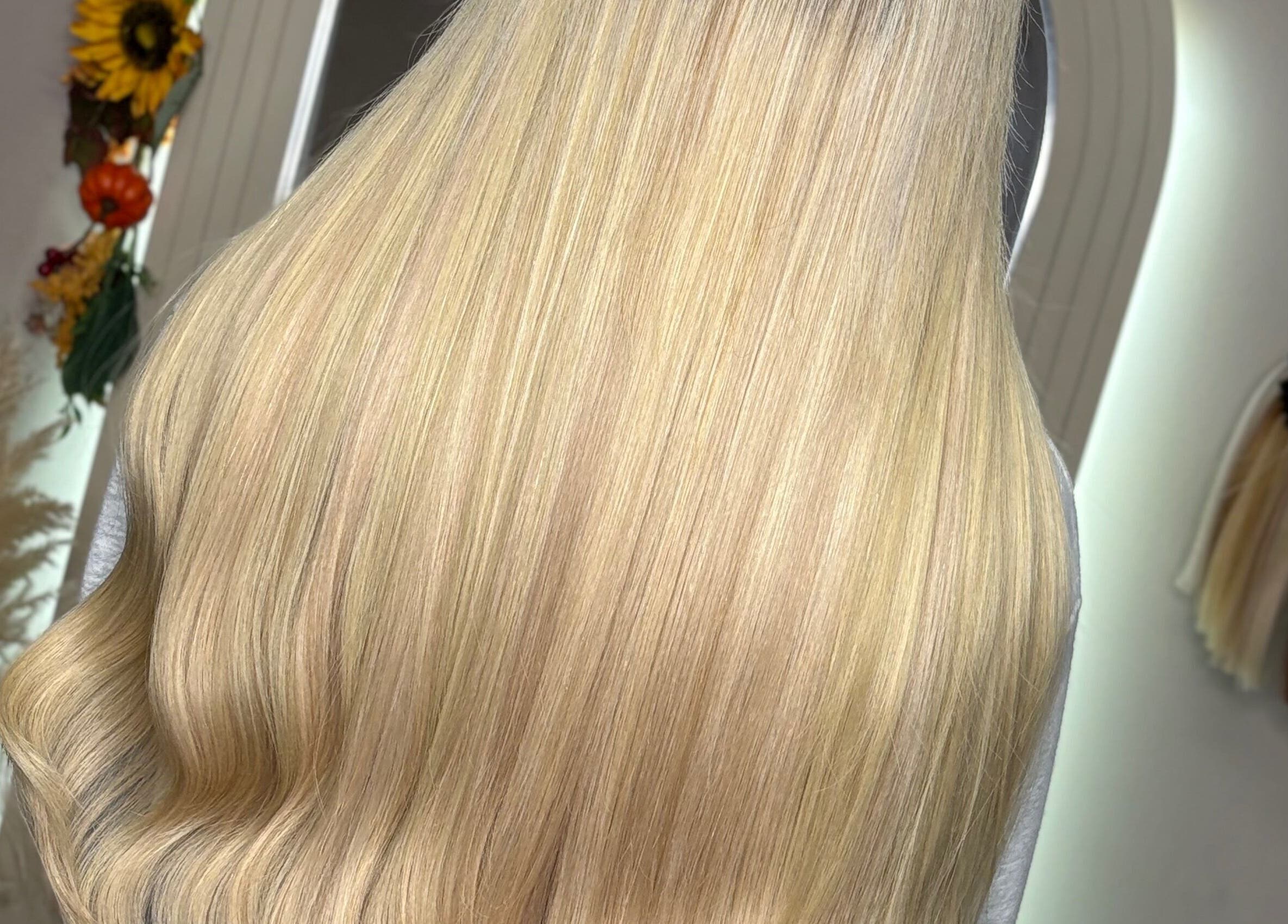 Sleek blonde hair extensions at Hair Extensions By Maria, Mexborough, England, GB salon.