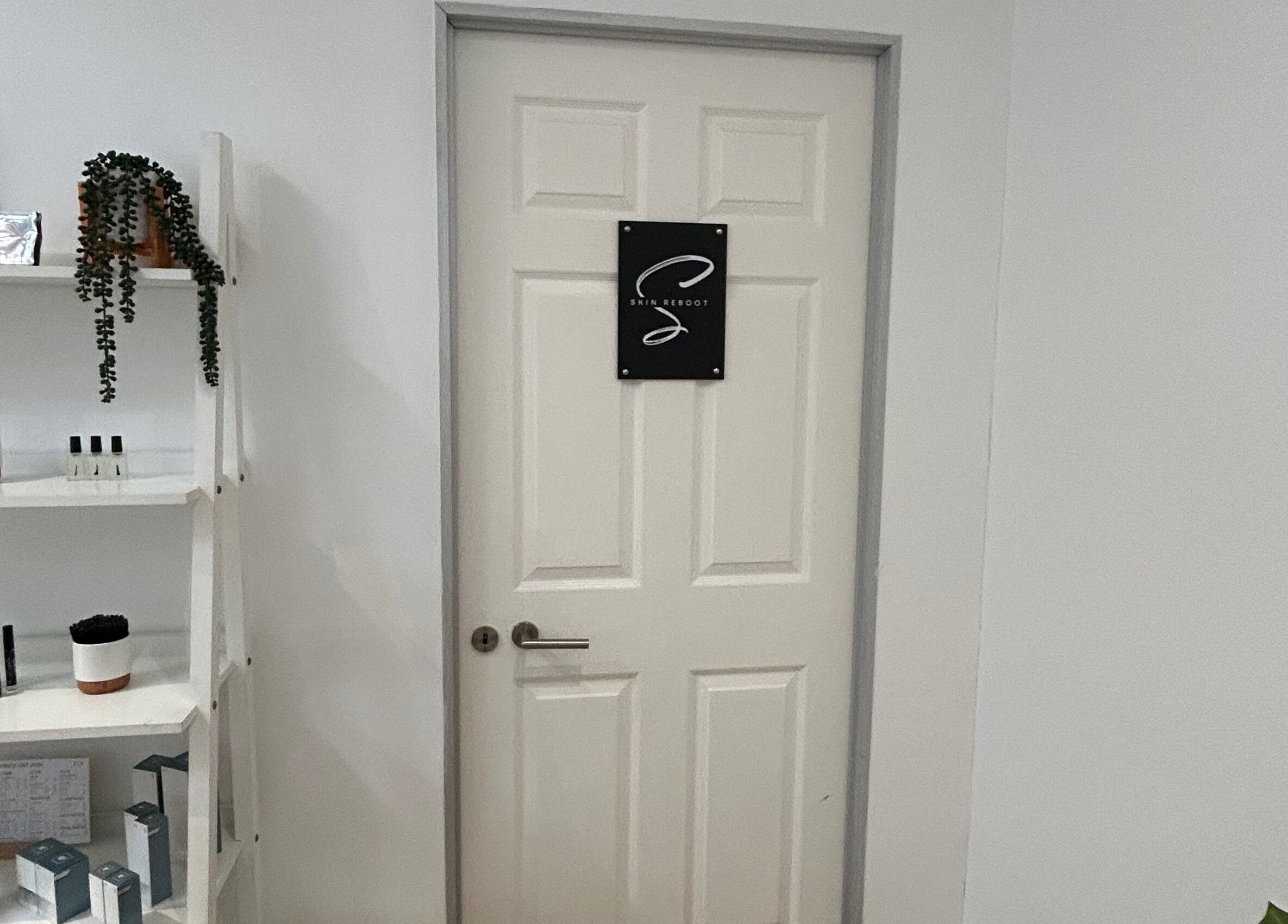 Entrance to Skin Reboot in Cape Town, Western Cape, ZA with product display on shelves.