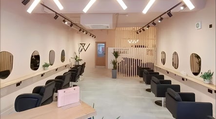 Stylish interior of Blend By Anna, Carlisle, England, GB with modern salon chairs and mirrors.