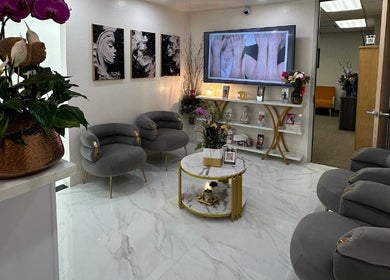 VitaGlow MD Wellness & Skin Clinic reception area with stylish seating in San Jose, California, US.