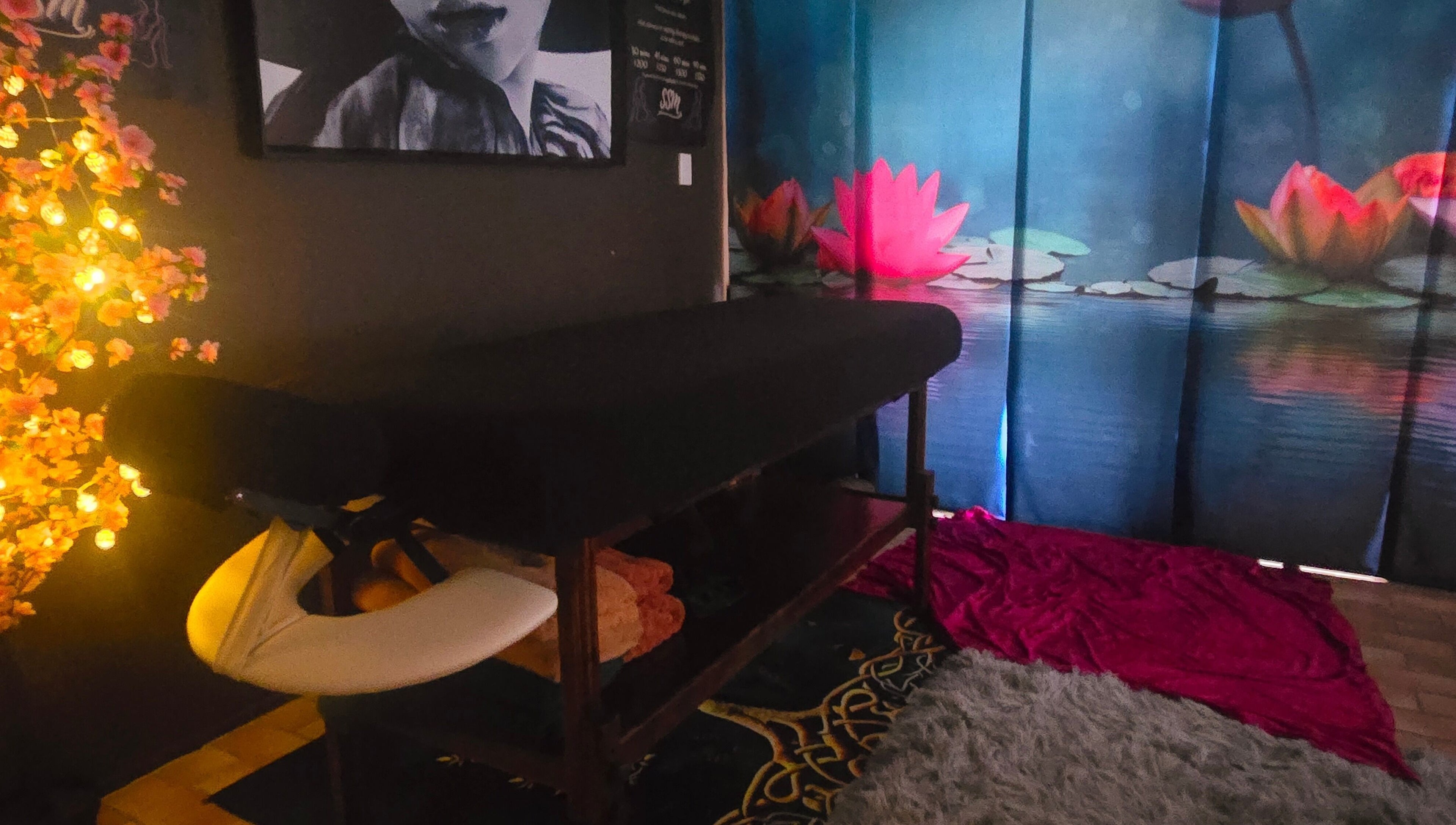 Relaxing massage room at SSM Massage, Andergrove, Queensland, AU, featuring serene decor and ambient lighting.