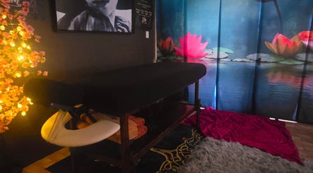 Relaxing massage room at SSM Massage, Andergrove, Queensland, AU, featuring serene decor and ambient lighting.