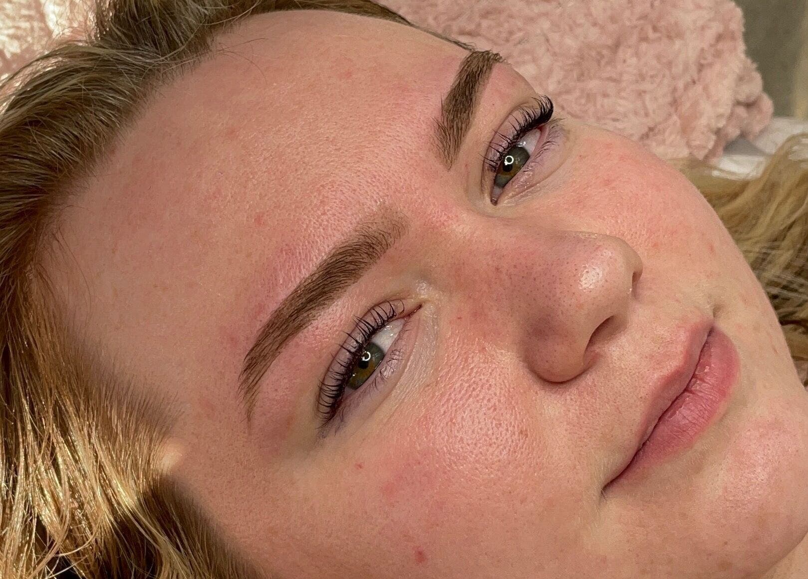 Close-up of a woman post-treatment at Céru Beauty, Lytham St Annes, England, GB, showcasing flawless skin.