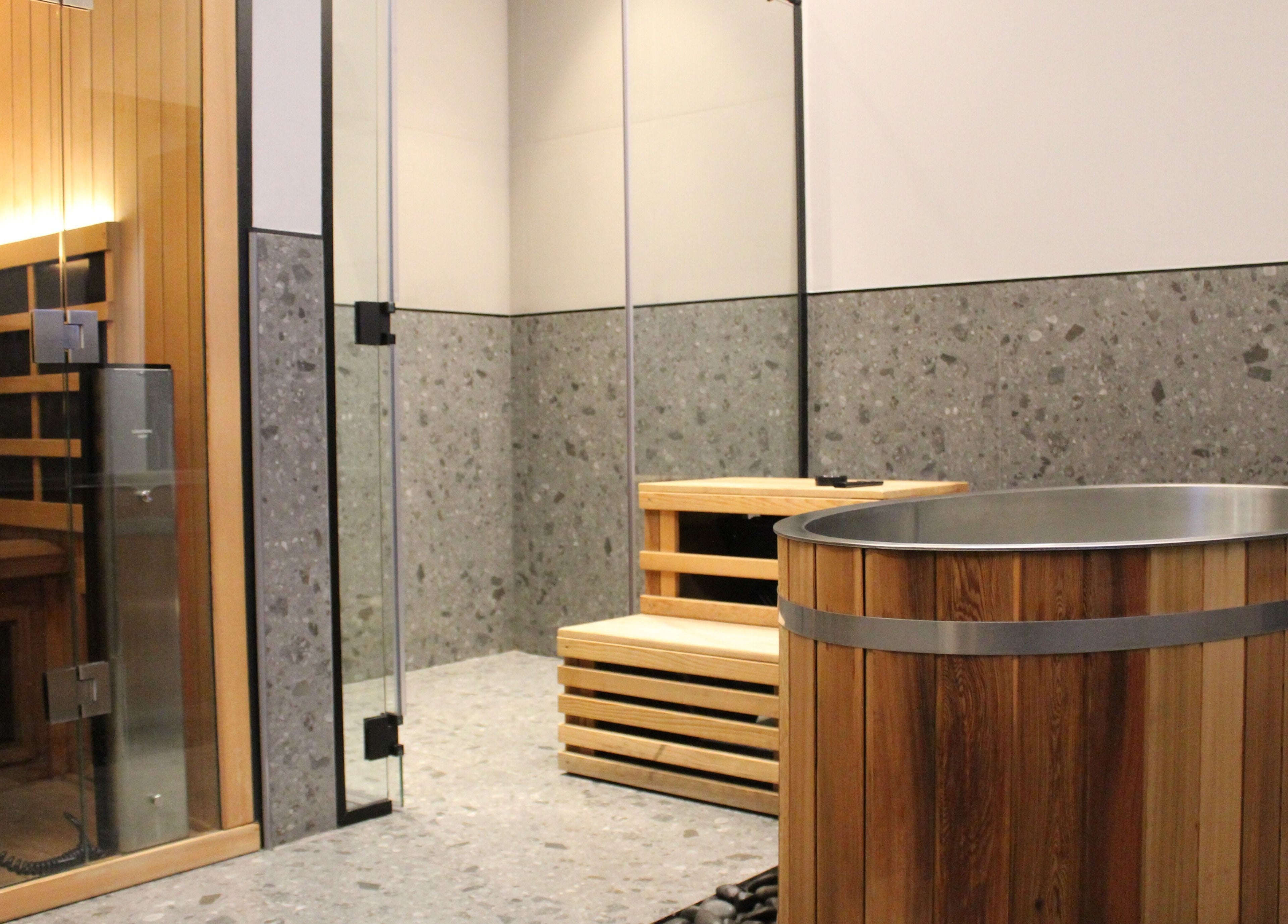 Luxurious sauna and wooden hot tub at Beit Sisu, Dubai, Dubai, AE offering ultimate relaxation.