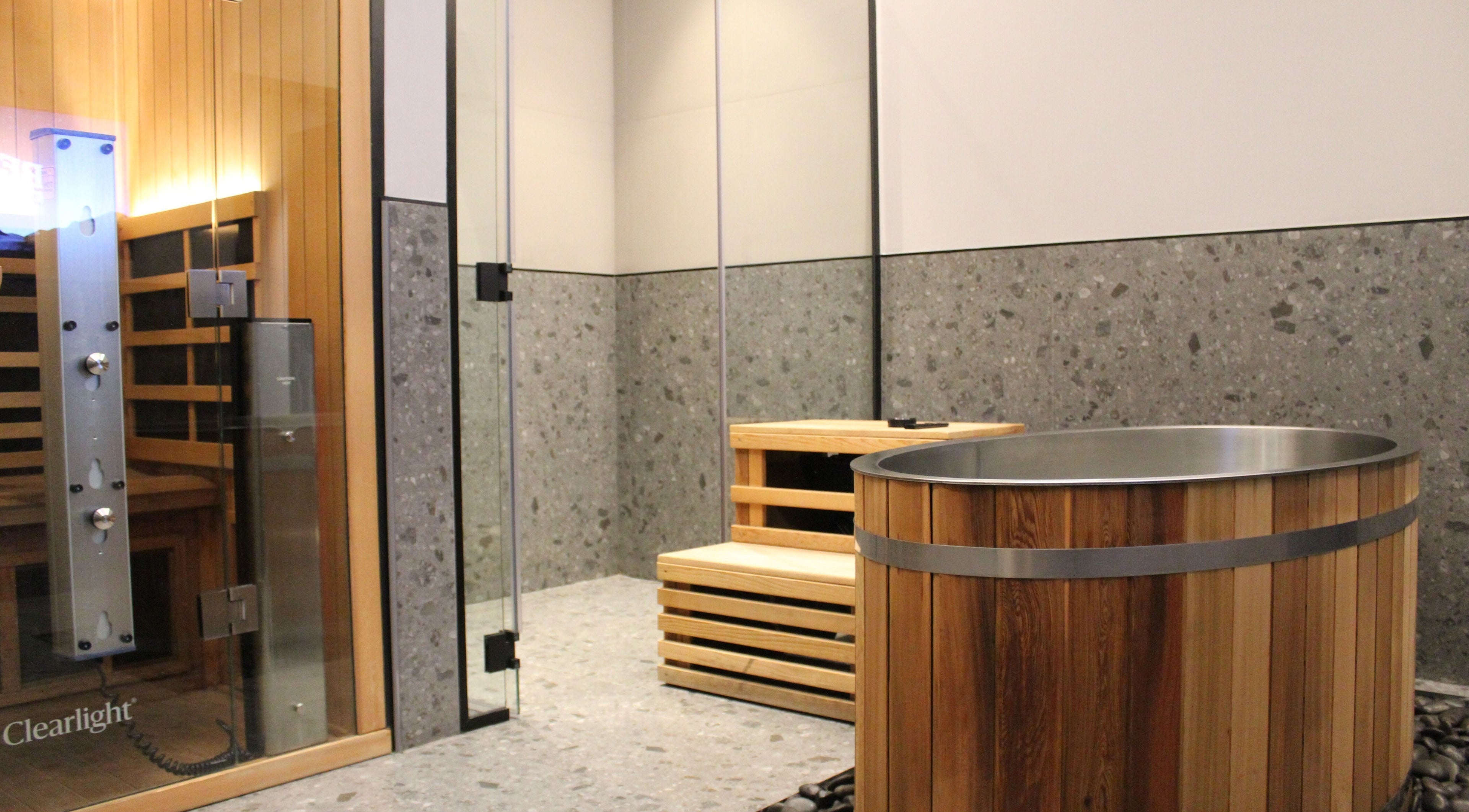 Luxurious sauna and wooden hot tub at Beit Sisu, Dubai, Dubai, AE offering ultimate relaxation.