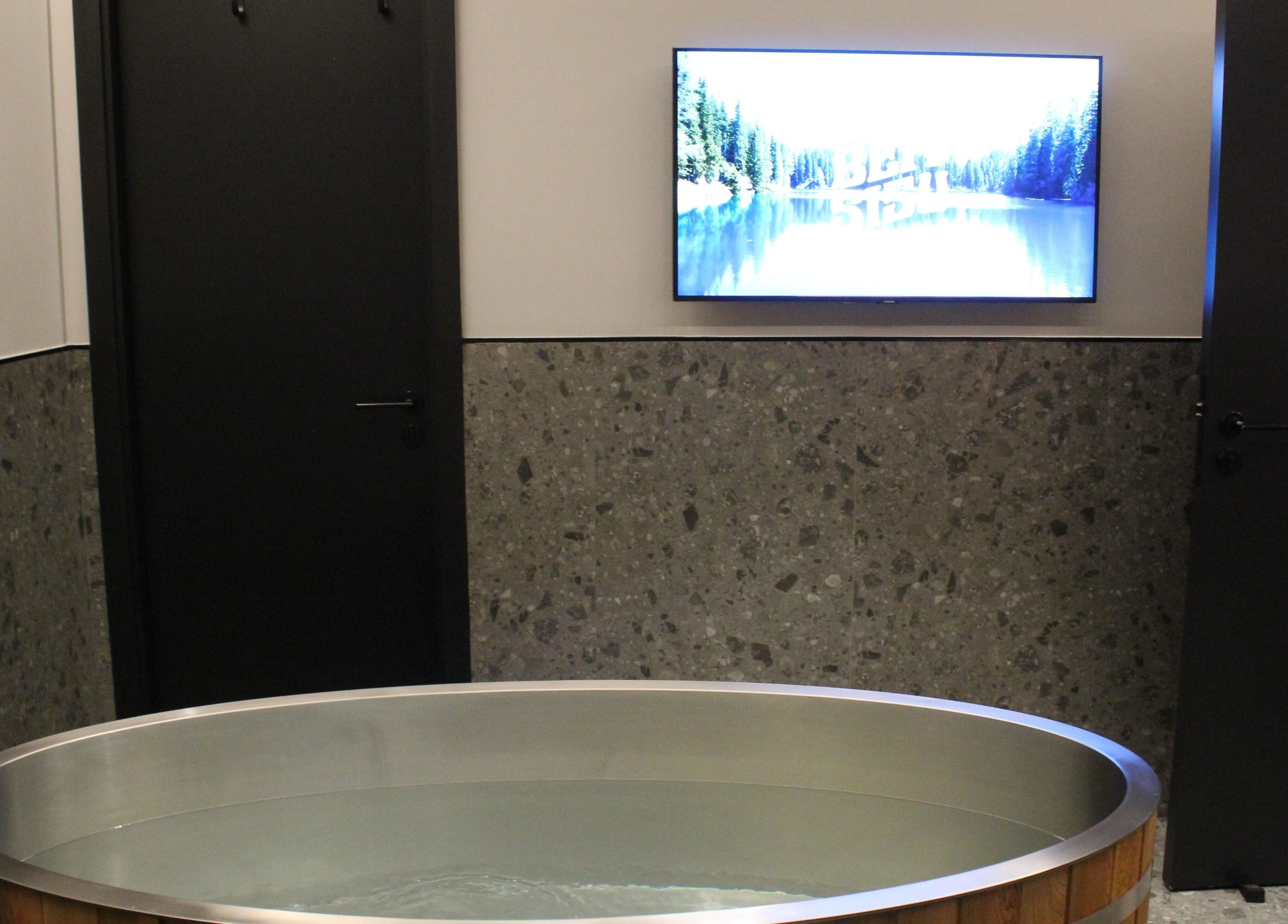 Relaxing spa tub at Beit Sisu, Dubai, Dubai, AE with serene decor and soothing atmosphere.