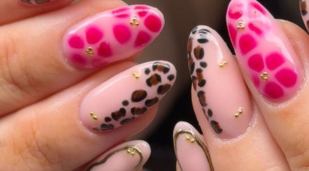 Vibrant nail art at Nailed It Bc, Hereford, England, GB showcasing cheetah and abstract patterns.