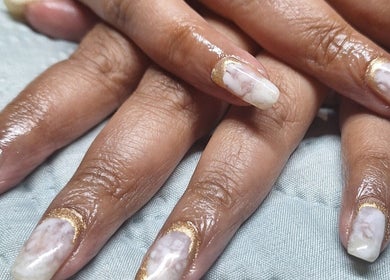 Elegant marble-designed nails at Raven Nails by Michélle, Roodepoort, Gauteng, ZA. Chic manicure service.