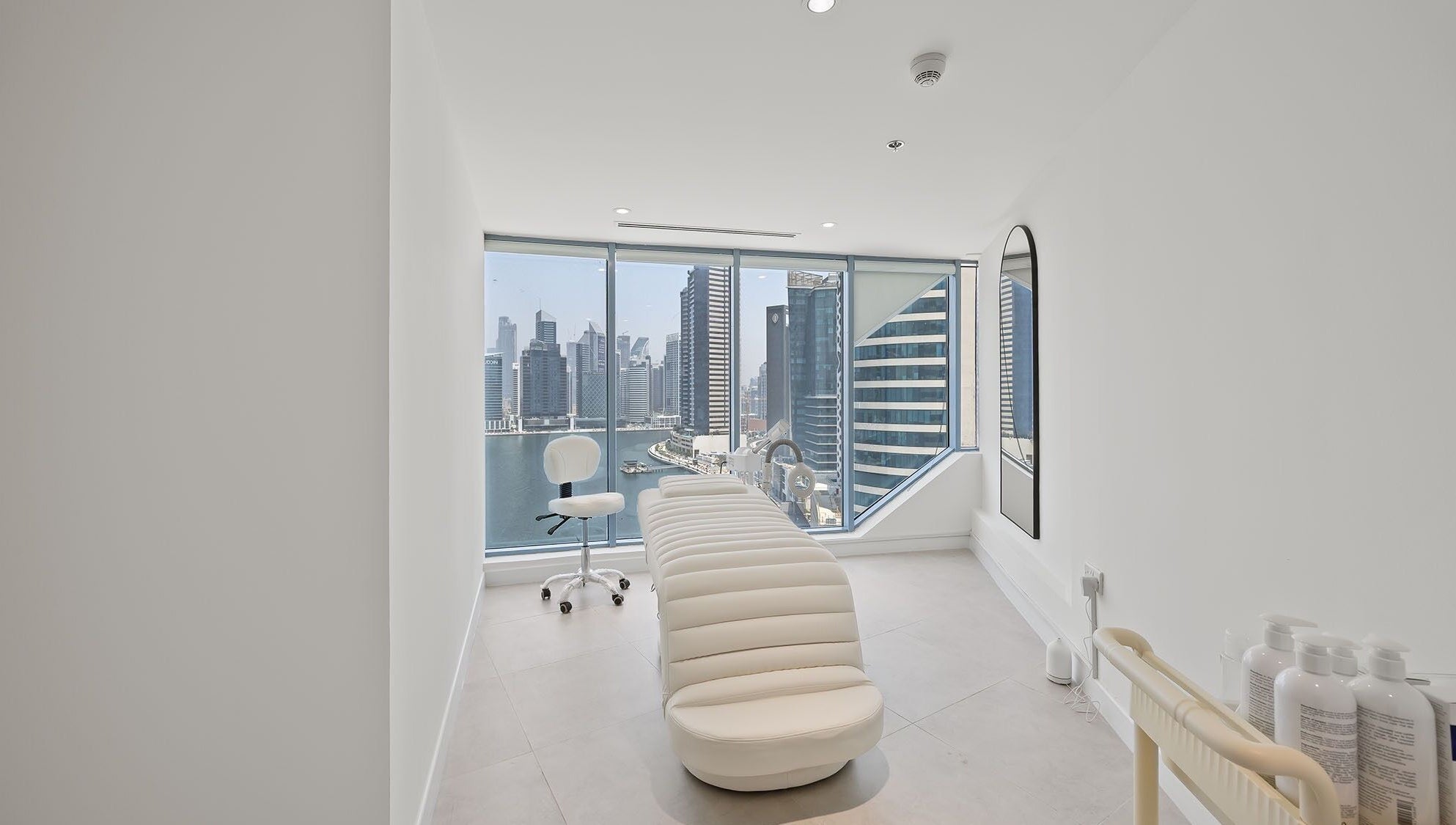 Luxurious treatment room at Nush Skincare Dubai with stunning skyline views, located in Dubai, Dubai, AE.