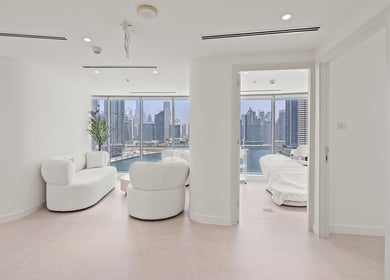 Chic interior of Nush Skincare Dubai with cityscape views, located in Dubai, Dubai, AE.