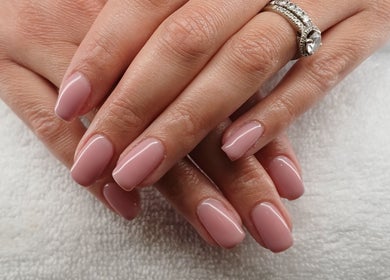 Elegant nude manicure at Nomsa's Nails and Beauty, Midrand, Gauteng, ZA, showcasing perfect nail care.