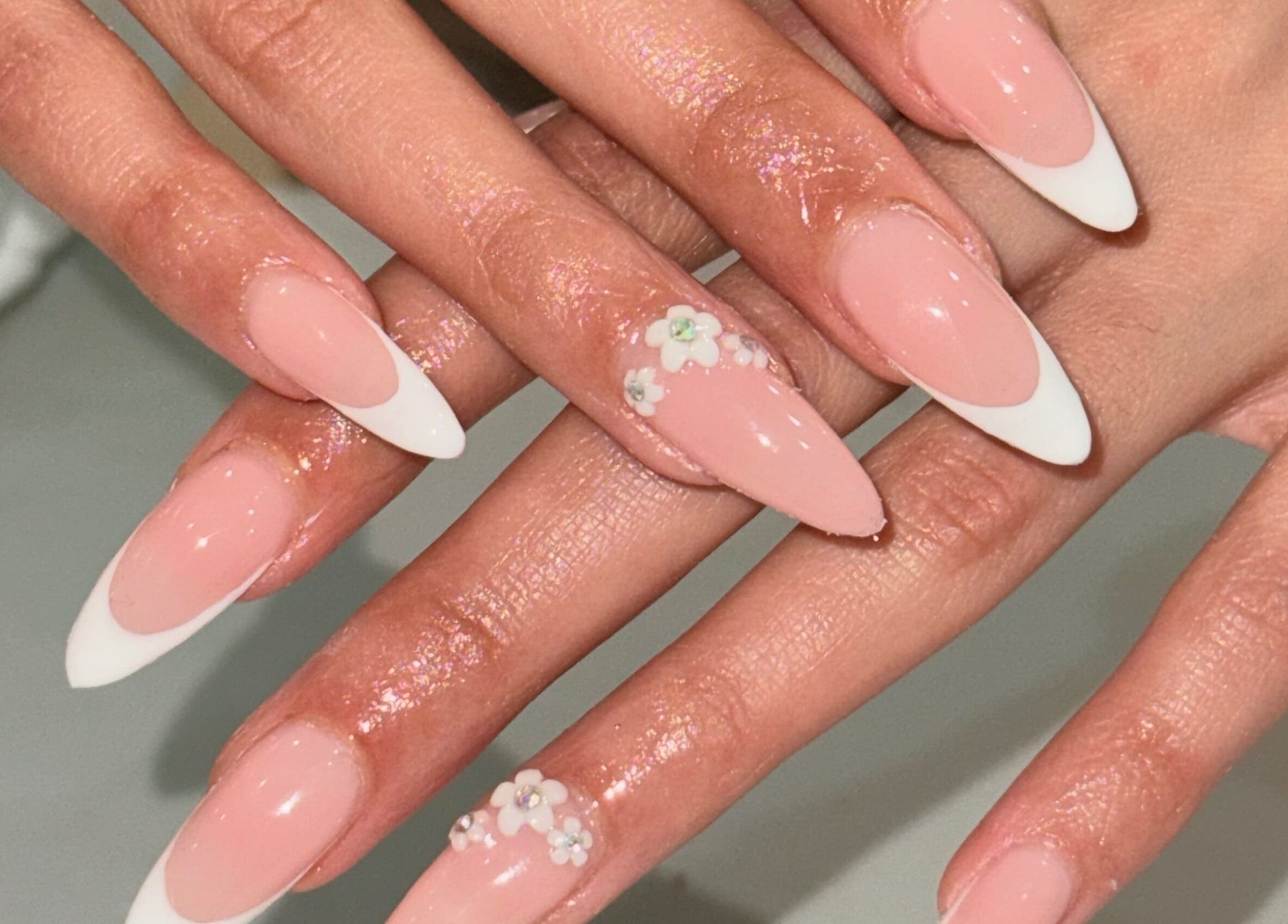 Elegant floral nail art with French tips at Nails by Teri, Queensburgh, Kwazulu-natal, ZA.