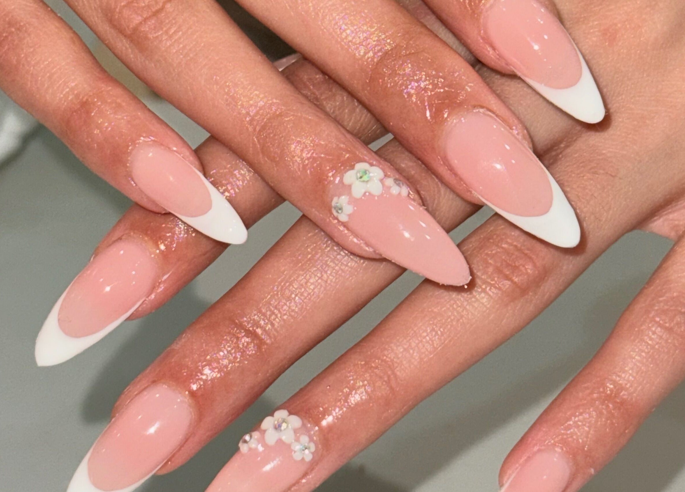 Elegant floral nail art with French tips at Nails by Teri, Queensburgh, Kwazulu-natal, ZA.