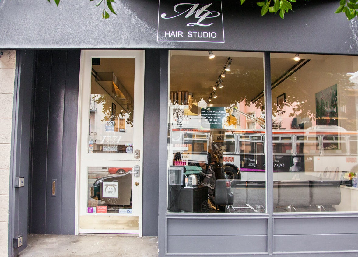 Front of ML Hair Studio in San Francisco, California, US, showcasing the stylish entrance and street view.
