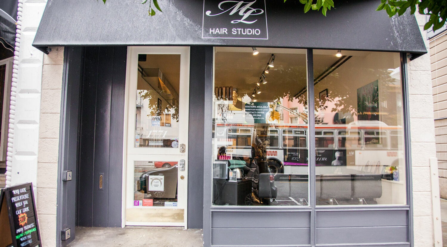 Front of ML Hair Studio in San Francisco, California, US, showcasing the stylish entrance and street view.