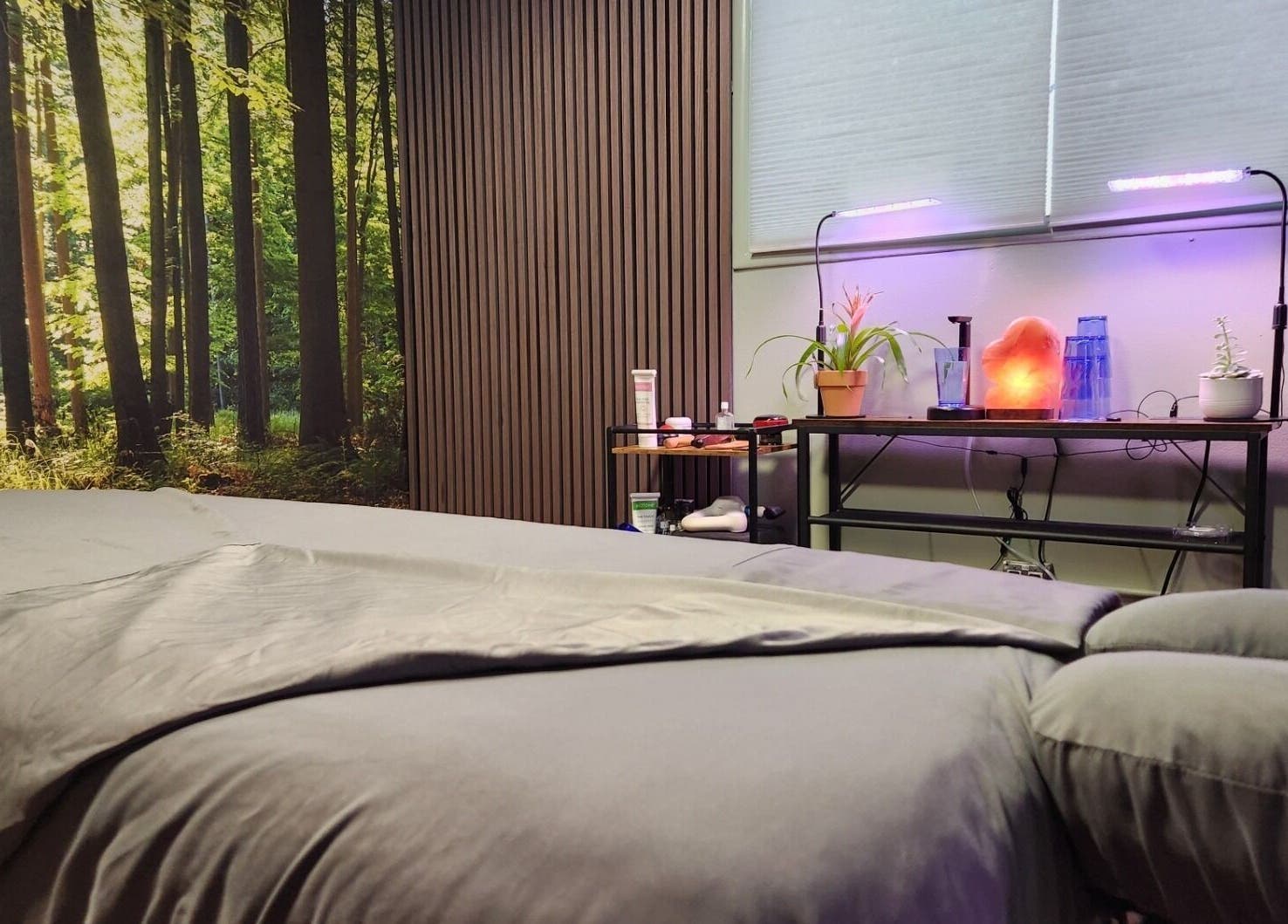 A calming forest-themed massage room at VitaKinesis - movement is life, Los Angeles, California, US.